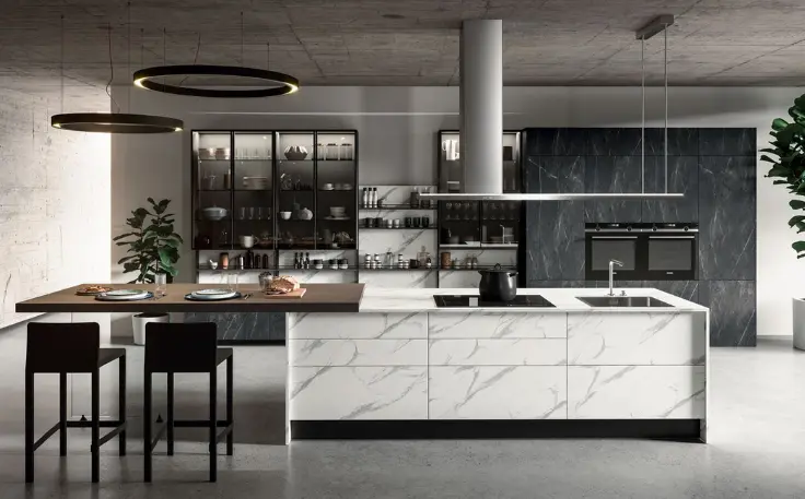 Elegant kitchen featuring marble worktops, black and white accents, and contemporary appliances