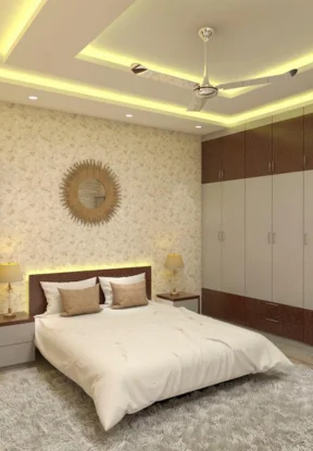 An ceiling fan and a bed create a serene bedroom, part of the inspired-badrooms collection.