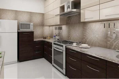 A cooking surface, microwave use and and the refrigerator located in an immaculately cleaned kitchen