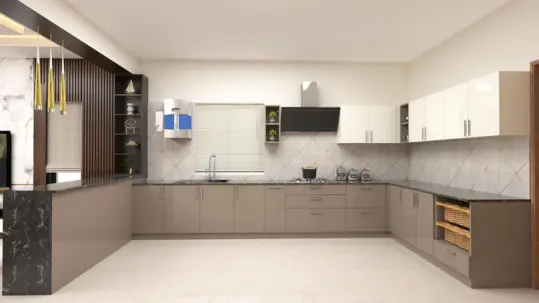 The interior design of An u-shaped spacious kitchen featuring a sizable island and a refrigerator.