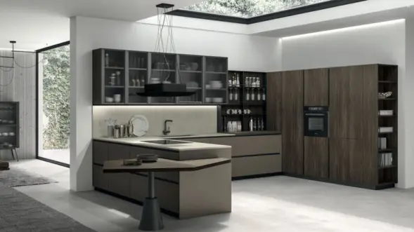 contemporary kitchen with a spacious skylight illuminate the sleek countertops & kitchen appliances
