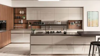 A sleek modular kitchen design showcasing a roomy island and trendy bar seating with vibrant colours