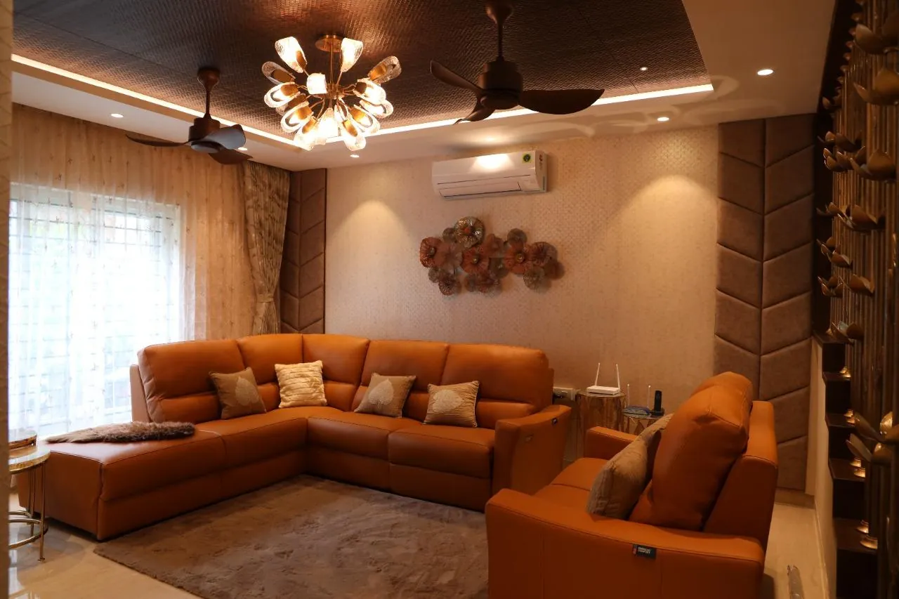 RICCO completed living room with warm layered lighting