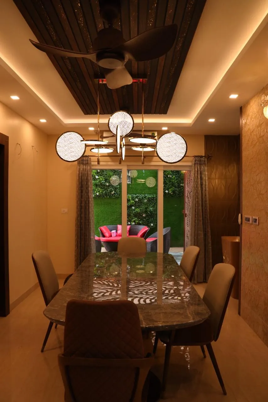 Dining room completed by RICCO with statement lighting